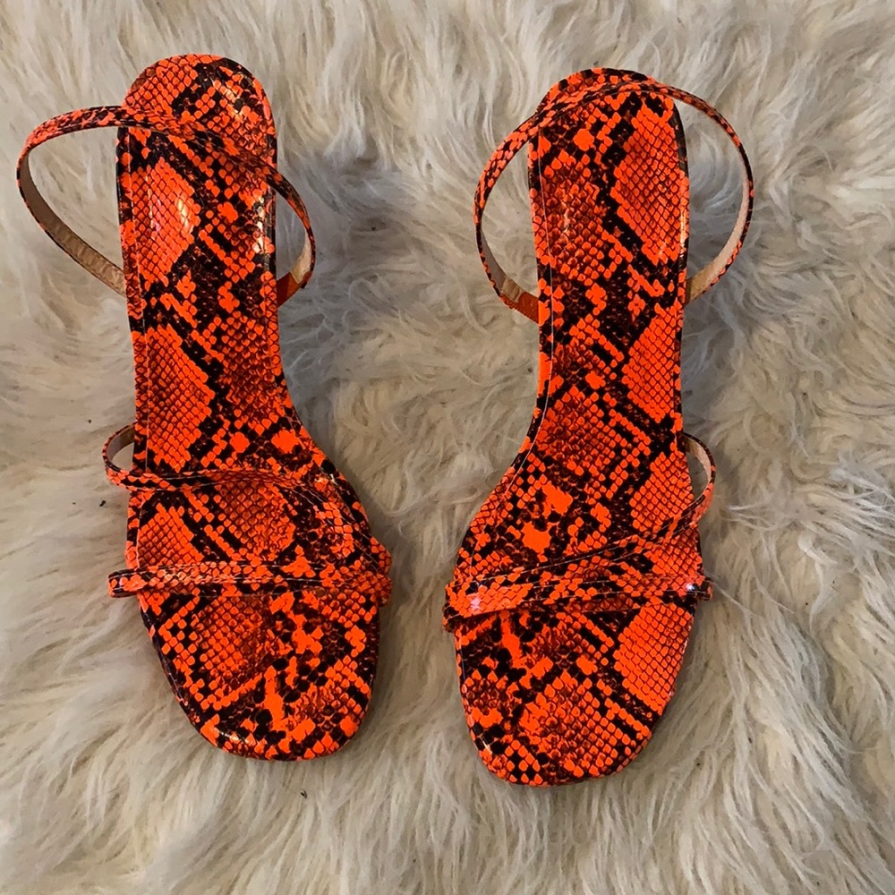 Bright orange kitten heels